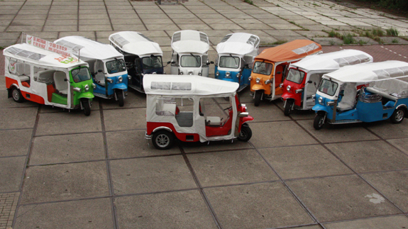 Multicoloured electric tuk-tuks. Image: TukTukFactory