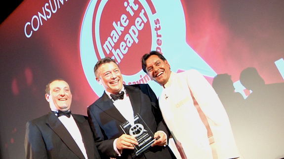 MIC's Jonathan Elliott accepts the Consumer Champion award from Haven Power's Richard Robey and ELN Editor Sumit Bose.